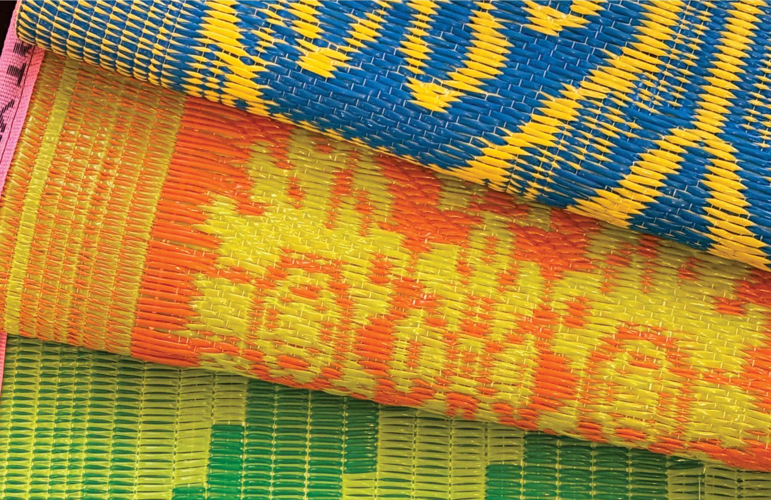 PP woven fabric orange color pp roll manufactured at lanka polysacks (pvt) ltd dambulla. Lanka Mats